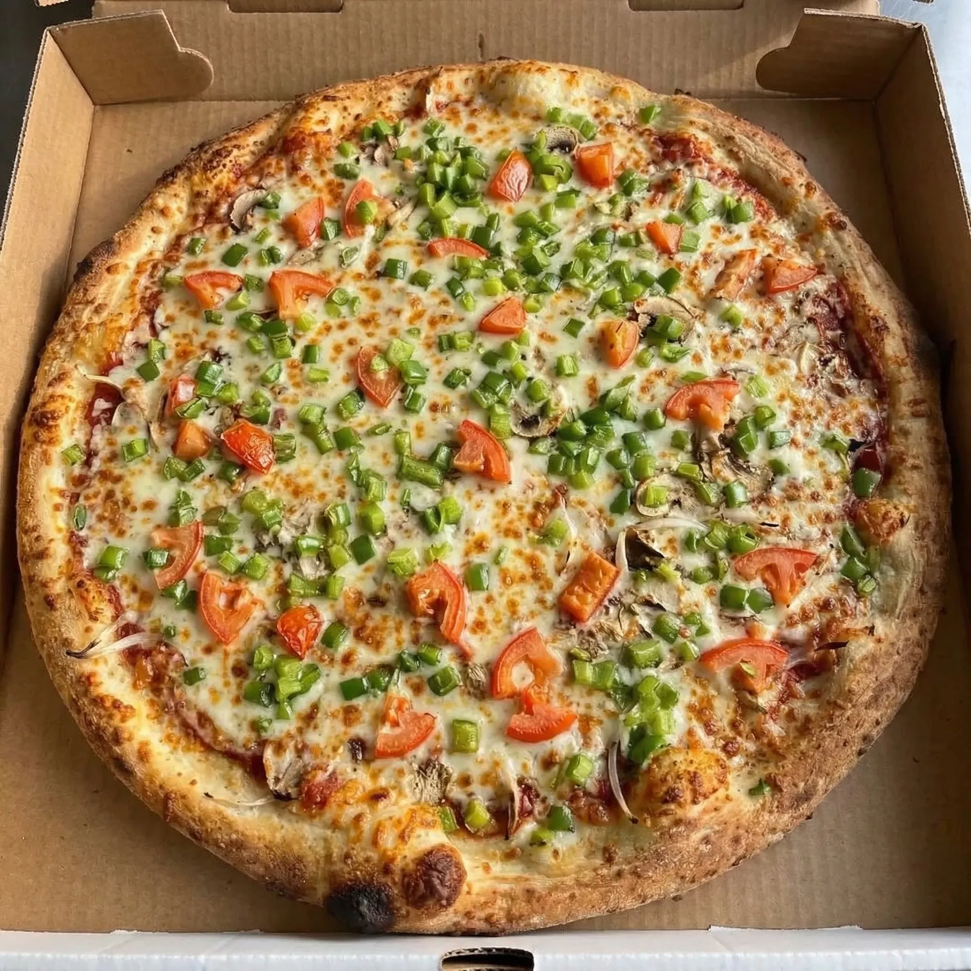 BBQ chicken pizza and specialty pizzas at Pangaea Pizza Northmount Drive NW Calgary